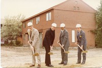 Walsh Hall exterior: groundbreaking, J. Donald Monan and three unidentified men with shovels