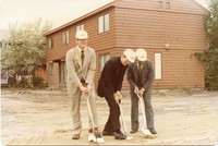 Walsh Hall exterior: groundbreaking, J. Donald Monan and two unidentified men with shovels