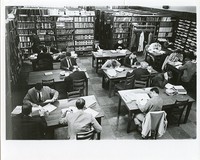 Students studying in science library