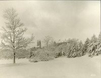 Gasson Hall and Saint Mary&#39;s Hall from reservoir in winter, by Clifton Church