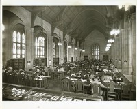Bapst Library interior: Gargan Hall facing entrance with students studying