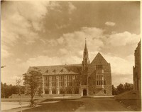 Devlin Hall exterior from quad with tree, by Clifton Church