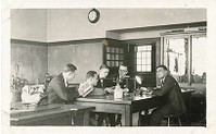 Devlin Hall interior: physics lab with Joe Koslowski, Sunny Foley, and Tom Rafferty (members of the class of 1925), and John Shork