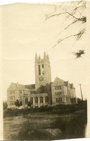 Gasson Hall exterior: front from field with power lines