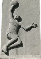 Roberts Center exterior: relief of basketball player