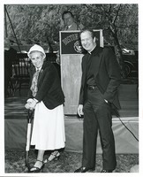 Robsham Theatre exterior: groundbreaking, J. Donald Monan and unidentified woman with shovel
