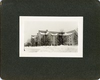 Saint Mary&#39;s Hall exterior: side view with snow by Clifton Church