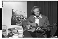 David Hammond, filmmaker, radio producer and folk singer, playing his guitar