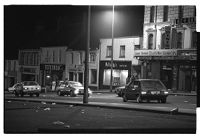 Off-duty Royal Ulster Constabulary (RUC) member shot through the window of the Oak Grill Restaurant, Castlewellan, County Down, his abandoned car and the scene at night