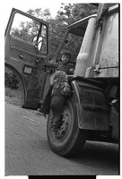 Two children playing in a lorry