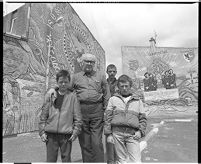 Des Wilson in front of mural honoring Provisional Irish Republican Army (PIRA) men killed by Special Air Service in Loughgall, County Armagh, Ballymurphy, Belfast