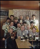 Lester Tumilty and others drinking and singing in a pub, Downpatrick