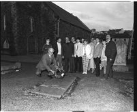 Tomas Mac Giolla with other members of the Worker&#39;s Party of Ireland, laying a wreath at the grave of Thomas Russell