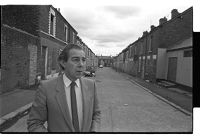 Hugh Smyth in his neighborhood, Shankill Road, Belfast