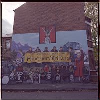 Republican and Loyalist wall murals, and Andersonstown Royal Ulster Constabulary (RUC) station, Belfast