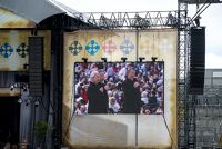 International Eucharistic Congress, 50th, priests singing on stage at the Final Day Ceremony, Croke Park Gaelic Athletic Association (GAA) Stadium, Dublin