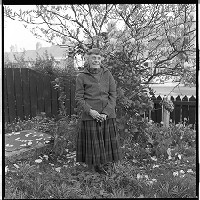 Anna Hoare, Protestant nun who came from England in 1969 to live in Catholic Ardoyne, portraits, at home in the Ardoyne, Belfast
